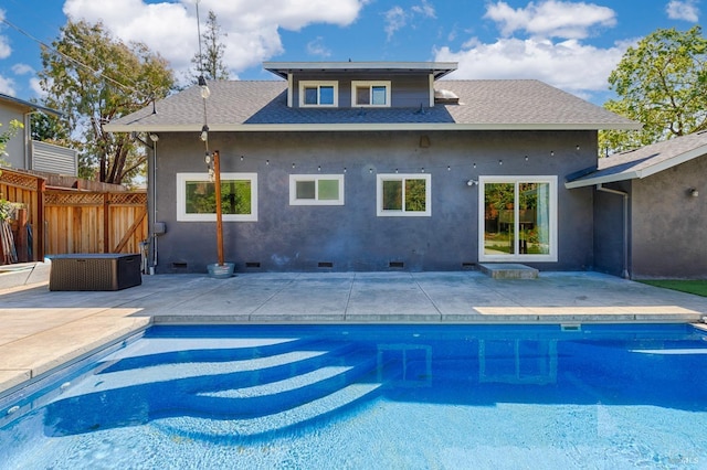 view of swimming pool featuring a fenced in pool, a patio, and fence