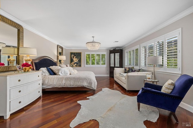 bedroom featuring a chandelier, baseboards, ornamental molding, and wood finished floors