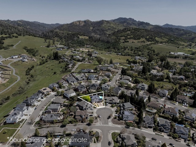 bird's eye view with a mountain view and a residential view