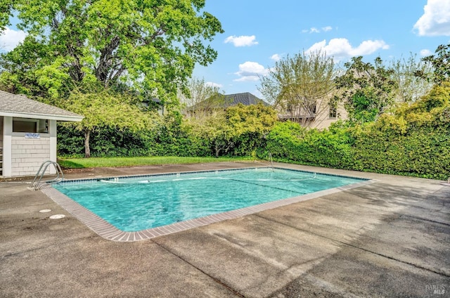 pool featuring a patio