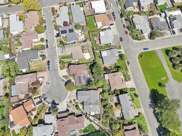 birds eye view of property with a residential view