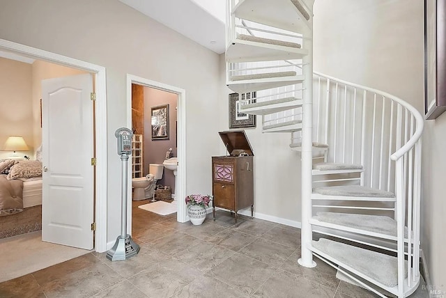 stairway with baseboards