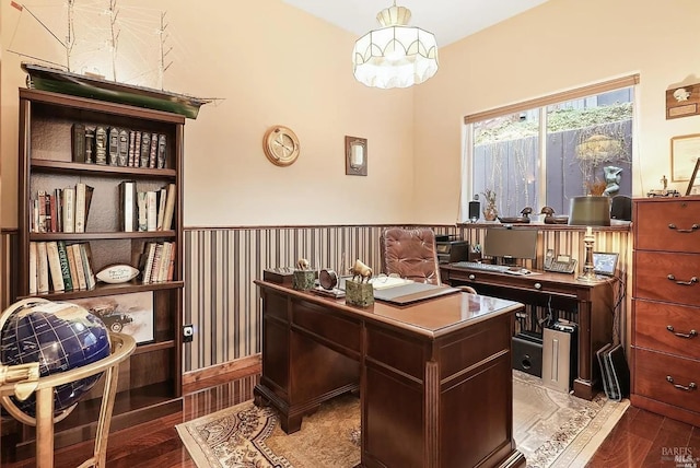 office featuring a wainscoted wall, a chandelier, and wood finished floors