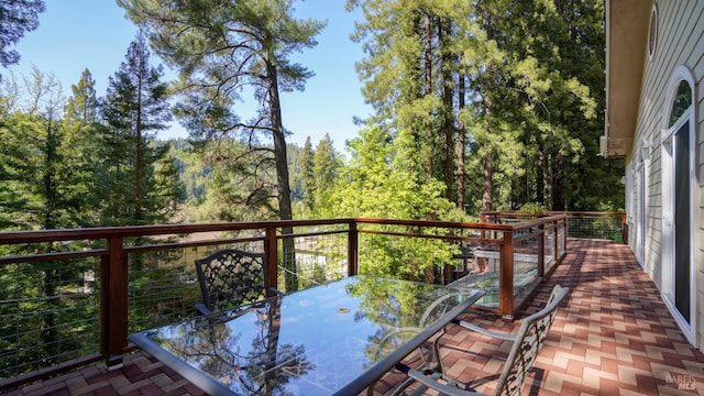 balcony featuring outdoor dining area