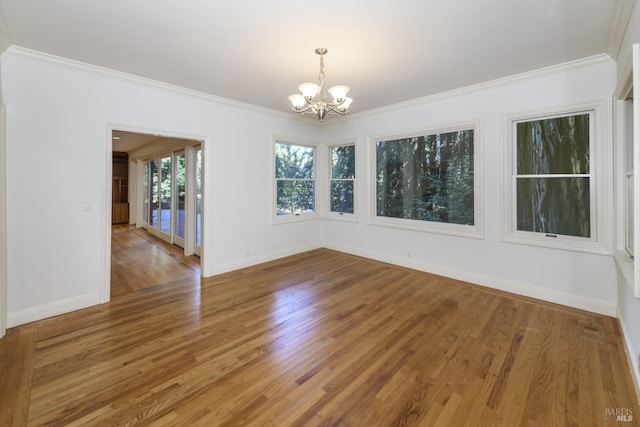 1065 Meadowsweet Dr, Corte Madera, CA 94925 - spare room with an inviting chandelier, ornamental molding, and wood finished floors