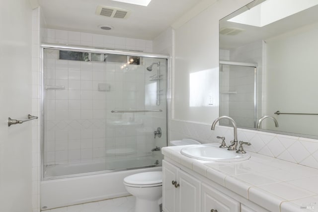 1065 Meadowsweet Dr, Corte Madera, CA 94925 - bathroom with visible vents, toilet, vanity, and shower / bath combination with glass door