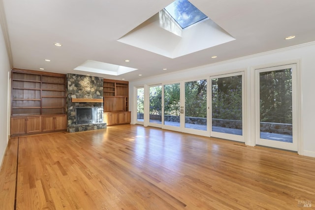 1065 Meadowsweet Dr, Corte Madera, CA 94925 - unfurnished living room with light wood-style flooring, crown molding, and a skylight