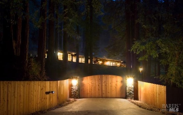 1065 Meadowsweet Dr, Corte Madera, CA 94925 - gate at twilight featuring fence