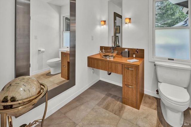 511 Kortum Canyon Rd, Calistoga, CA 94515 - bathroom with toilet, vanity, and baseboards