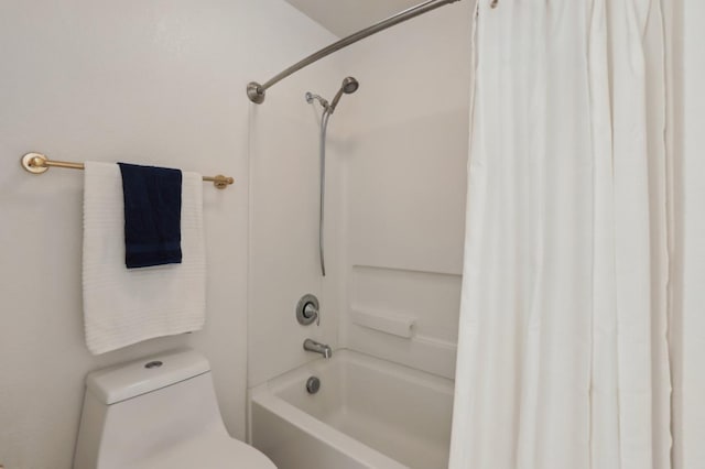 bathroom with toilet and shower / tub combo with curtain