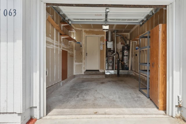 garage with heating unit and secured water heater