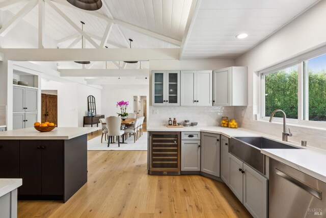1423 Butterfield Rd, San Anselmo, CA 94960 - kitchen featuring wine cooler, dishwasher, a sink, light countertops, and wooden ceiling