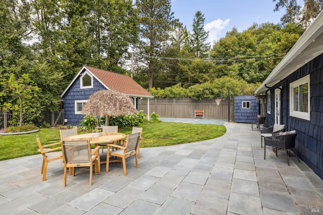 1423 Butterfield Rd, San Anselmo, CA 94960 - view of patio / terrace with an outdoor structure, outdoor dining area, and a storage shed