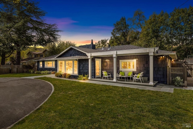 1423 Butterfield Rd, San Anselmo, CA 94960 - back of house at dusk with covered porch