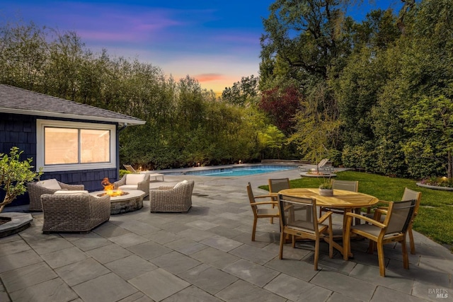 1423 Butterfield Rd, San Anselmo, CA 94960 - patio terrace at dusk featuring an outdoor fire pit, an outdoor pool, and outdoor dining area