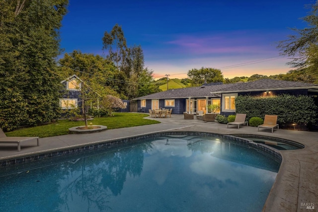 1423 Butterfield Rd, San Anselmo, CA 94960 - pool at dusk with a patio area, a yard, and a pool with connected hot tub