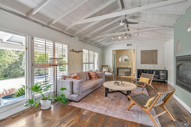 living room with a fireplace, hardwood / wood-style flooring, and ceiling fan