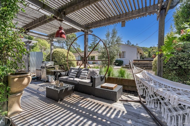 view of patio / terrace featuring a pergola, an outdoor hangout area, a wooden deck, fence, and area for grilling