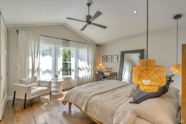 bedroom with vaulted ceiling, hardwood / wood-style flooring, baseboards, ceiling fan, and recessed lighting
