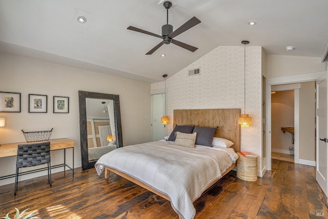 bedroom featuring lofted ceiling, hardwood / wood-style floors, baseboards, wallpapered walls, and a ceiling fan