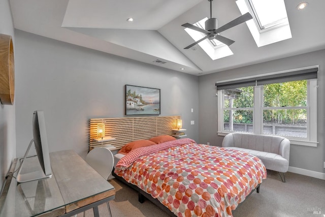 carpeted bedroom featuring a skylight, lofted ceiling, baseboards, recessed lighting, and a ceiling fan
