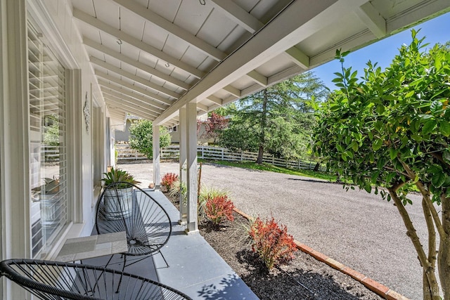 view of patio / terrace featuring fence