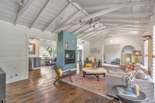 139 Deer Hollow Rd, San Anselmo, CA 94960 - living room with hardwood / wood-style flooring, beamed ceiling, a fireplace, high vaulted ceiling, and arched walkways