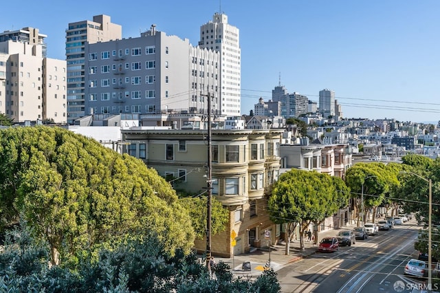 view of building exterior featuring a city view