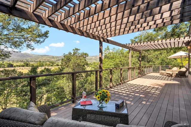 522 Meadowood Ln, Saint Helena, CA 94574 - wooden deck featuring an outdoor living space, a pergola, and a mountain view