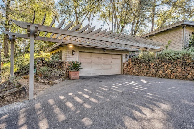 garage with aphalt driveway