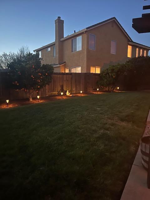 view of yard featuring fence