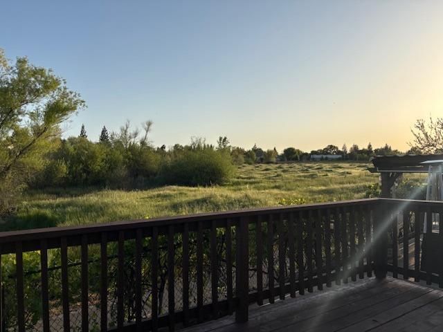 view of balcony at dusk