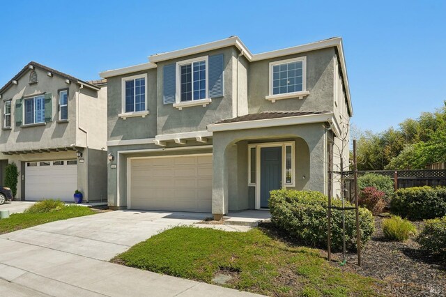 668 Jade Way, Fairfield, CA 94534 - view of front of property featuring stucco siding, fence, an attached garage, and driveway