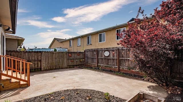 view of patio with a fenced backyard