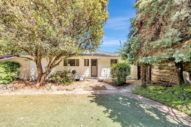 view of front of home with a front yard