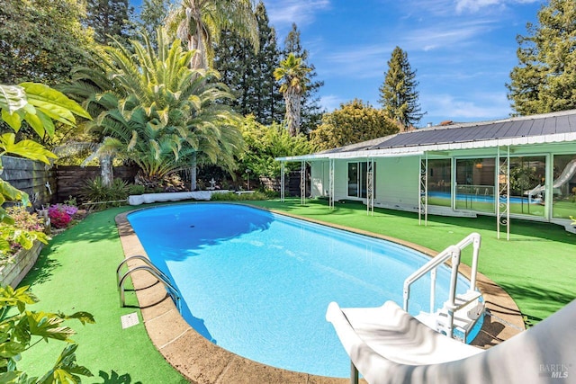 view of swimming pool featuring a fenced in pool and a fenced backyard