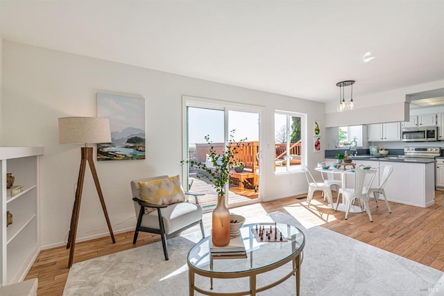 141 Albatrosse Way, Vallejo, CA 94589 - living room with light wood-style floors and baseboards
