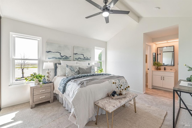141 Albatrosse Way, Vallejo, CA 94589 - bedroom featuring ceiling fan, lofted ceiling with beams, light colored carpet, ensuite bath, and baseboards