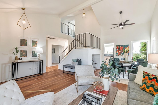 141 Albatrosse Way, Vallejo, CA 94589 - living area with high vaulted ceiling, stairway, a ceiling fan, and wood finished floors