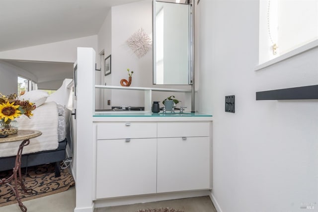 bathroom with finished concrete flooring and vanity