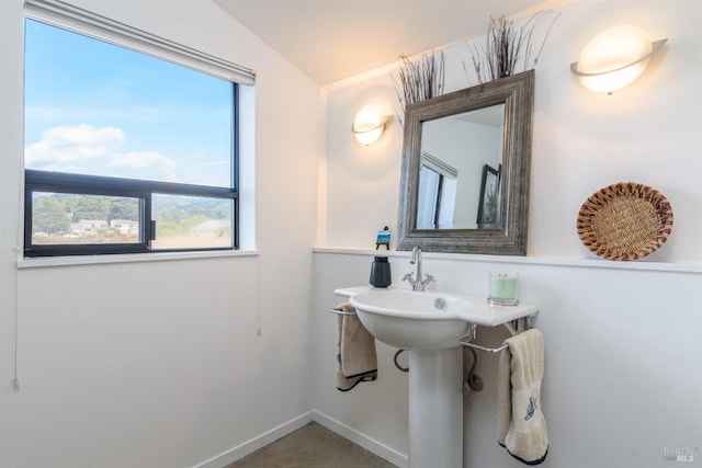 bathroom featuring baseboards