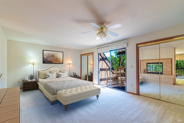 carpeted bedroom featuring access to exterior and a ceiling fan