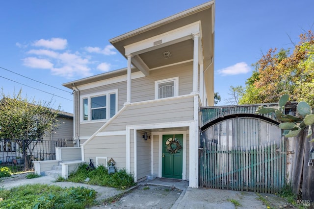 view of front of property with fence
