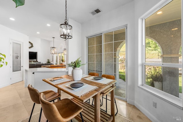dining space featuring recessed lighting, an inviting chandelier, visible vents, light tile patterned floors, and baseboards