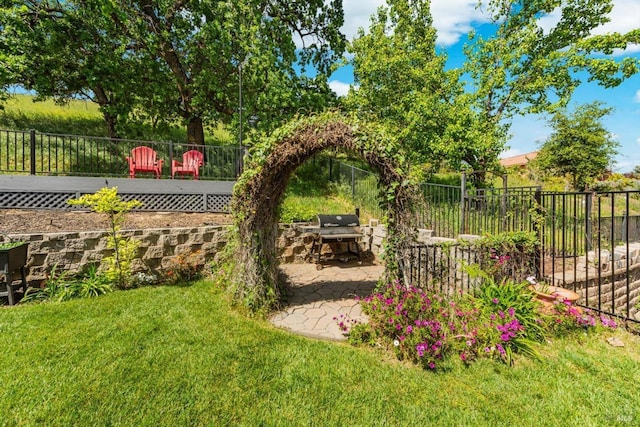 view of yard with a patio area and fence