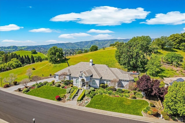 bird's eye view with a mountain view
