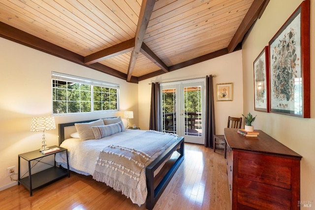 bedroom with light wood-style floors, french doors, access to outside, and lofted ceiling with beams