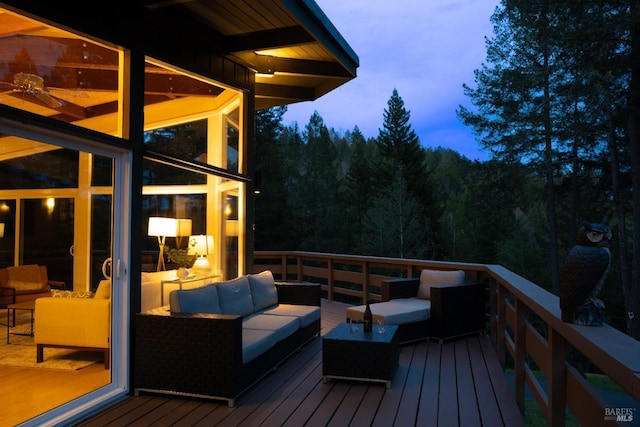 deck featuring outdoor lounge area