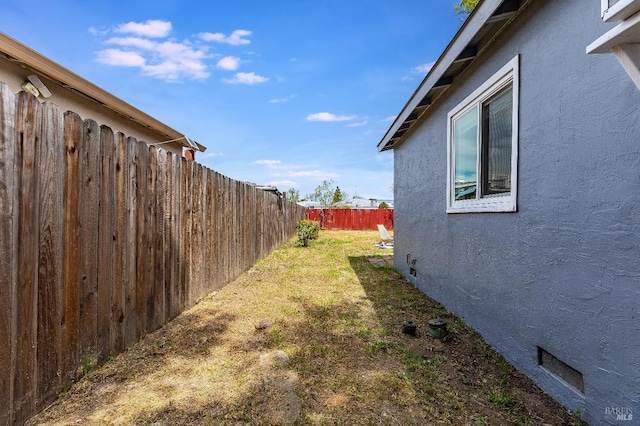 view of yard featuring fence