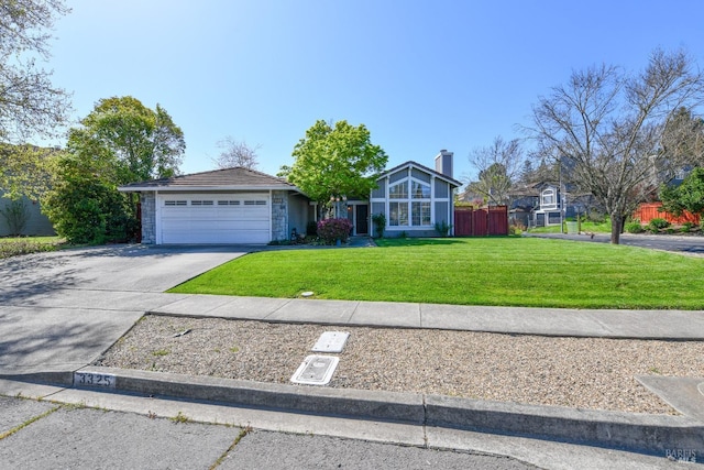 view of front facade with stone siding, a front lawn, aphalt driveway, a garage, and fence